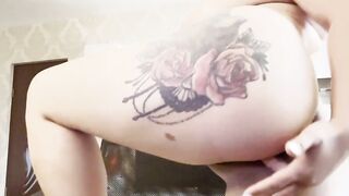 Blonde tattooed girl fingering ass and pussy
