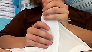 Handsome twink shoves a giant dildo up his rear and cums