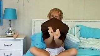 Handsome twink shoves a giant dildo up his rear and cums