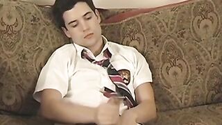 Jock student takes his uniform off to jerk his big cock off