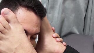 Blindfolded stud Drew Harper foot worships by horny Dan Edwards
