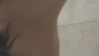Twink Kaylo Riley masturbates after a seductive shower scene