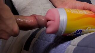 Twink pleases his massive penis with massive flashlight