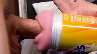 Twink pleases his massive penis with massive flashlight