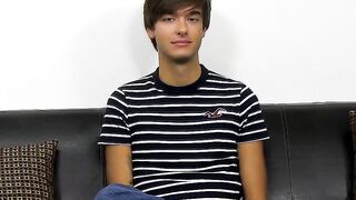 Young dude with bangs pleases himself after the interview