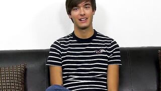 Young dude with bangs pleases himself after the interview