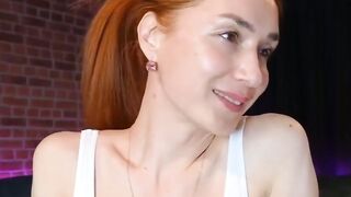 Redhead shemale jerking her shaved cock