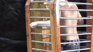 BondageBadBoy.com - BDSM fun with caged dude tormented with hot wax and harsh nipple