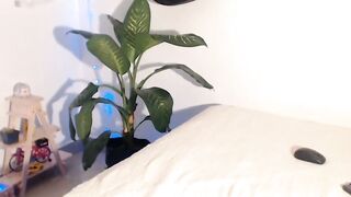 Tattooed Latina sucking dildo