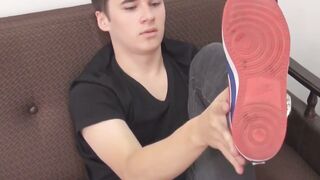 GuysToeSucking.com - Young man plays with his beautiful feet while masturbating his c
