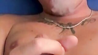 Handsome blonde explores his ass while blowing smoke