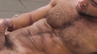 Muscular body Francois Sagat is soaking wet and worked up before releasing a jet of c