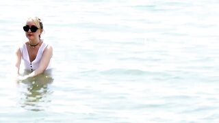 Blonde Bombshell Ann Joys Scorching Beach Burn
