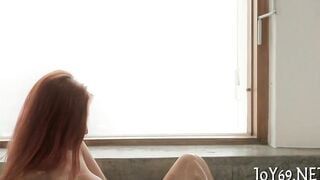 Solo gal slides her sextoy inside work