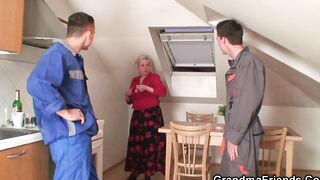 2 workers share very mature granny