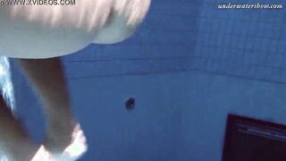 Gypsy african haired beauty swimming underwater