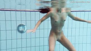 Gypsy african haired beauty swimming underwater