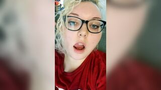 Kitten plays with her huge titties!