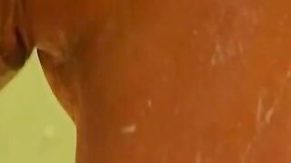 filer Blonde Bombshell Josine Turns Up the Heat in Steamy Shower Seduction