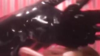 "Latex Domination: Lesbo Dominatrix Uses Sex Toys on Submissive Slave Girl"