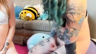 "Transgender Couple Sharing Intimate Moments With Sex Toy"