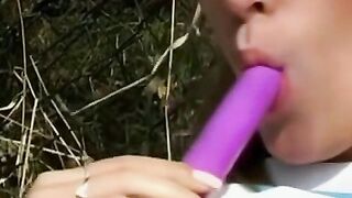 Outdoor Sex Kitten Doll Fucks Herself in Public Park
