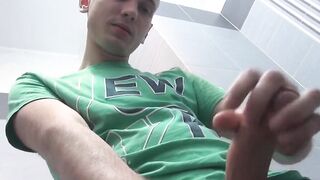 Hot twink masturbates solo in the bathroom with wild strokes