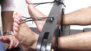 Daneâs muscle bound body was tied for tickle play