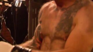 Muscular hunk endures bondage with pins in his chest