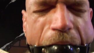 Muscular hunk endures bondage with pins in his chest