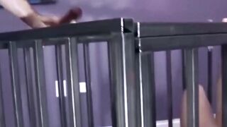Dominatrix in leather thongs uses fists to dominate submissive slave