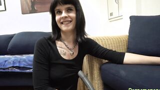 Czech dark hair plays with vacuum cleaner