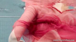 Katya Okuneva gets naked into her red panties underwater
