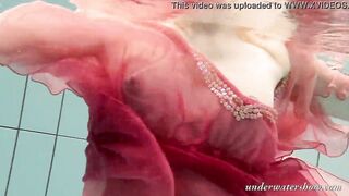 Katya Okuneva gets naked into her red panties underwater