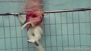 Katya Okuneva gets naked into her red panties underwater