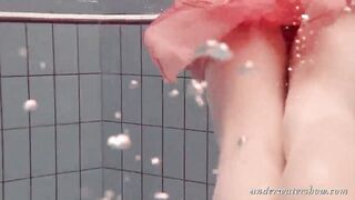 Katya Okuneva gets naked into her red panties underwater