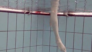 Katya Okuneva gets naked into her red panties underwater