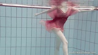 Katya Okuneva gets naked into her red panties underwater