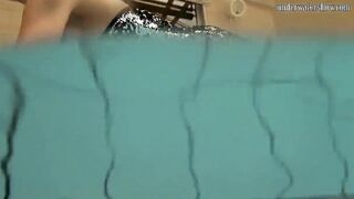 Loris Licicia bouncing her melons underwater