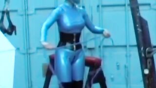 Redheaded Smoking Vixen Goes Latex in Behind-the Scenes