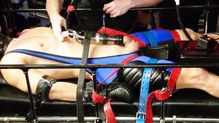 Domination Den - BDSM dungeon domina dominates submissive guy with bondage gear