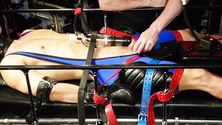 Domination Den - BDSM dungeon domina dominates submissive guy with bondage gear