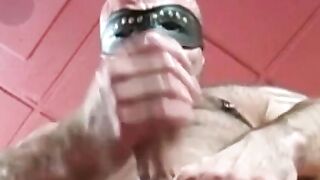 Masked Hairy Stud Gets Skilled Gay Blow Job From Older Guy