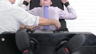 Businessmen Endure Electric Shock Therapy in BDSM Game Show