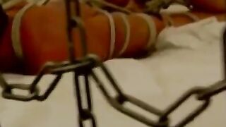 Bondage Babe Struggles And Suffers As Dominatrix Torments Her With Whips
