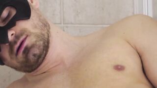 Mystery Hunk Unmasked In Solo Mastubration Session" or "Masked Muscle Guy Jerks Off For You
