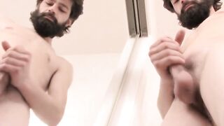 Beard-Stroking Hunk Masturabtes And Blasts A Load" or "Hairy Straight Guy Jerks Off Big Dick & Shoots Massive Amount Of Semen".