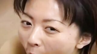 Japanese Cougar Delights In A Wild Threesome Adventure