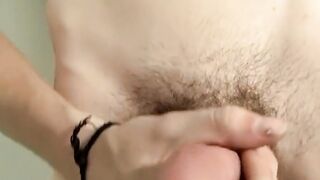 Hairy barely legal Stud Solo Strokes & Blasts Huge Load