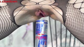 Tiffany has fun with a can of Pepsi and Red Bull